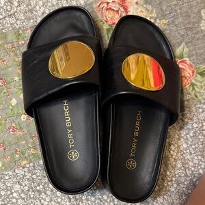Tory Burch Black Sandals with Gold Medallion